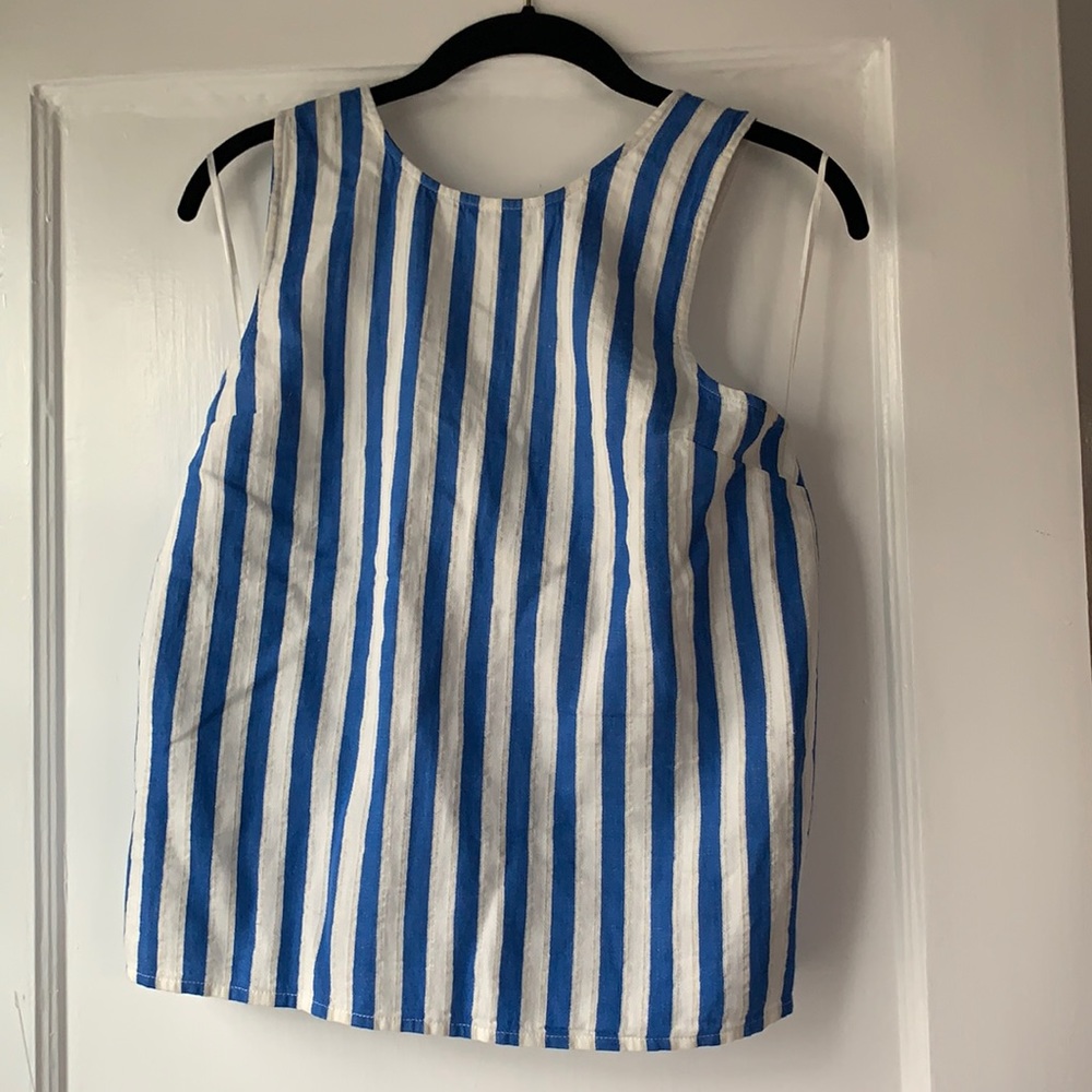Cross back white and blue blouse